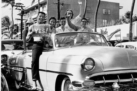 In this March 13, 1959 file photo, A group of supporters of statehood drive through the street in Waikiki, Honolulu, Hawaii.