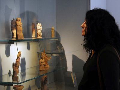 A visitor at the reopening ceremony for Syria's National Museum, in Damascus, Syria.