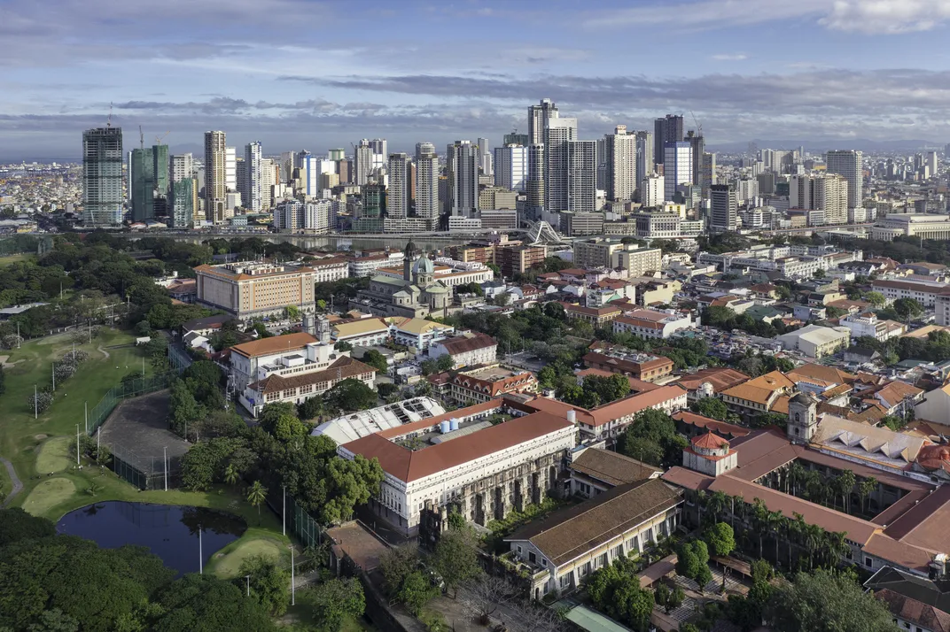 The modern cityscape of Manila overlooking historic Intramuros