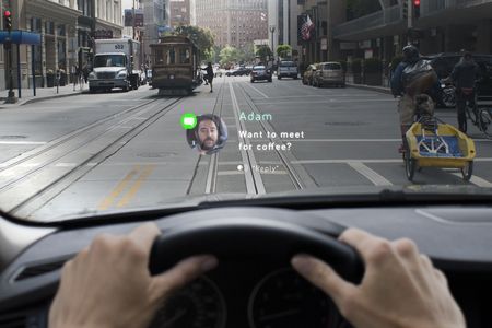 A rendering illustrates how messages will appear in mid-air using Navdy's new dashboard head-up display.