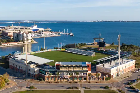The stadium features views of Pensacola Bay.