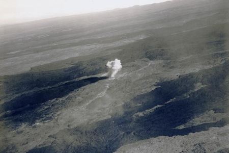 This image depicts one of 20 demolition bombs dropped in 1935 in an attempt to divert lava flow.