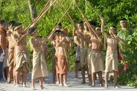 Members of Chamorro organizations, including the children from the Hurao Cultural Camp, perform a burial ceremony.