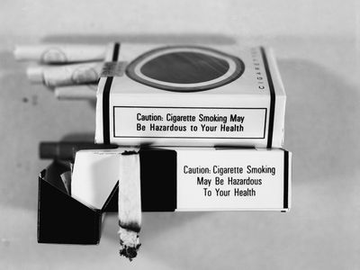 U.S. Surgeon General Luther Terry shocked Americans by announcing that cigarette smoking is a major cause of lung cancer, throat cancer and chronic bronchitis.