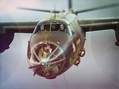 Even in the nose section of a Martin B-26B Marauder, an airman could take a drag. The nose gunner of the B-26 Fightin' Cock, based in the U.K. with the 9th Air Force, smokes during a mission.
