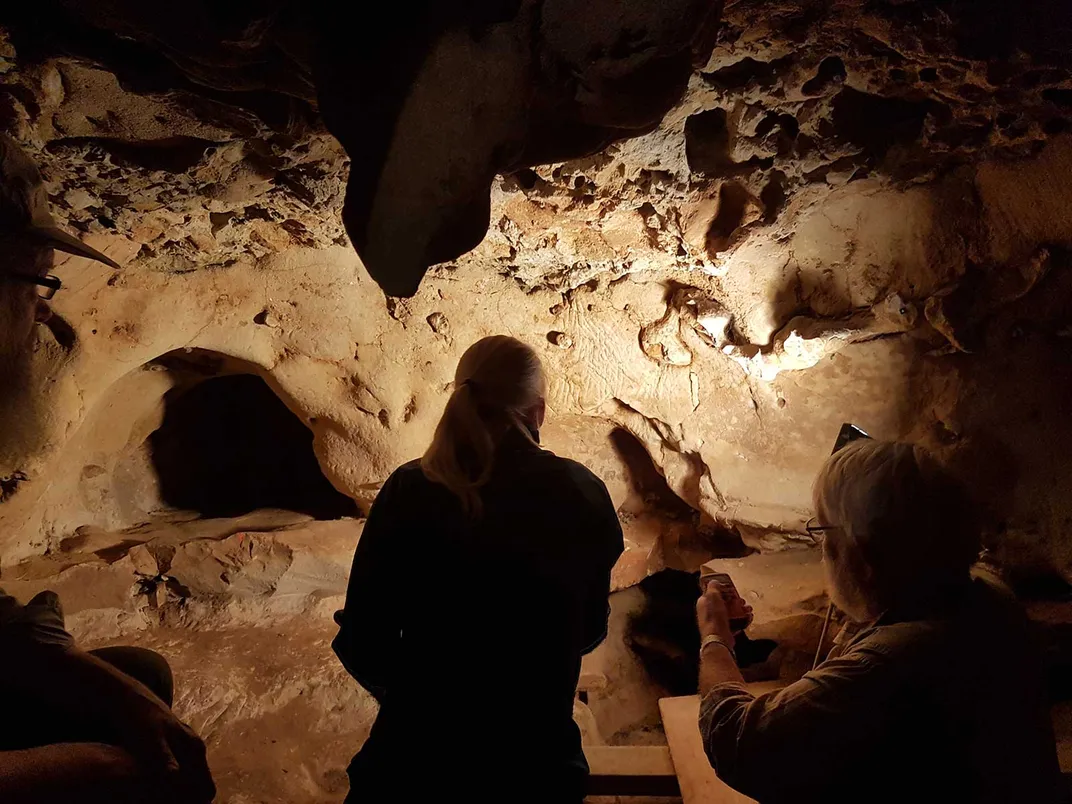 Scientists in La Roche-Cotard Cave