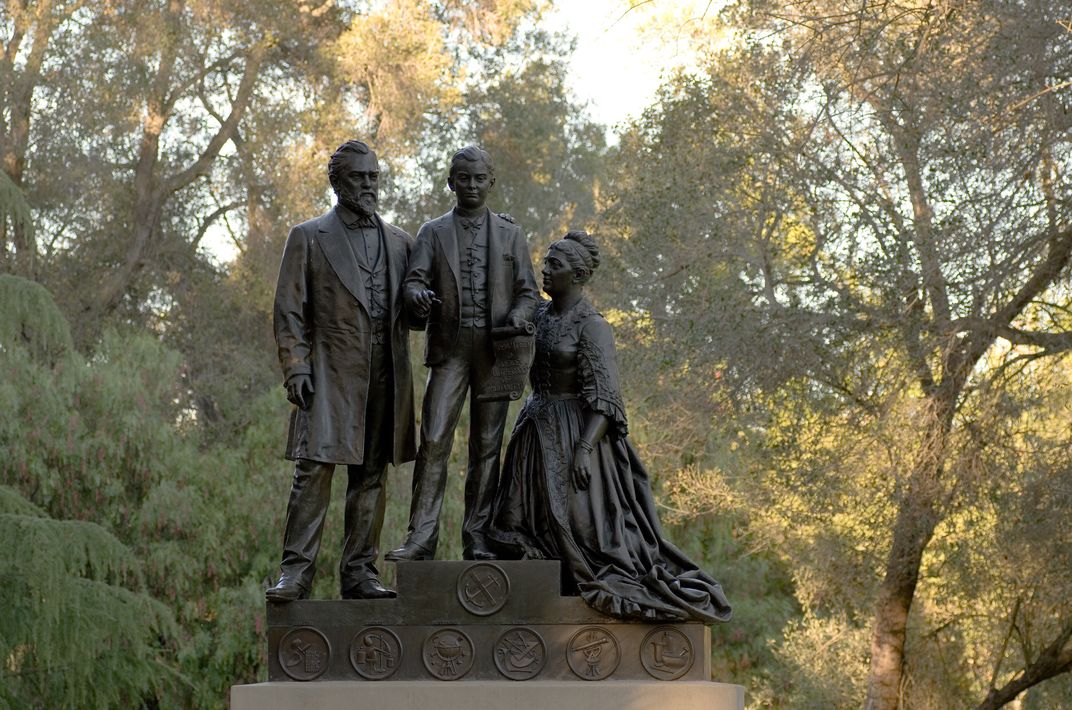 A statue of the Stanford family on Stanford University's campus