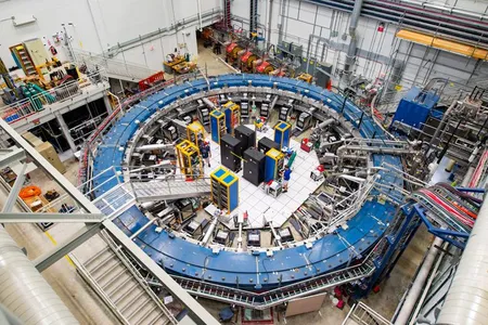 The 50-foot-wide racetrack used to study muons traveled by barge around Florida and up the Mississippi, and then by truck across Illinois.