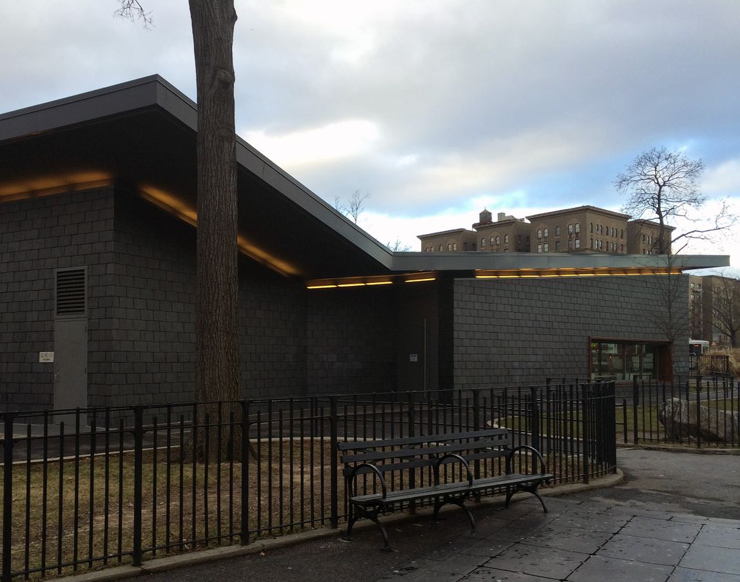 The Raven-inspired Poe Park Visitor Center designed by Toshiko Mori. The north side of the structure features a large window that frames a view of Poe's cottage.(image: Jimmy Stamp)