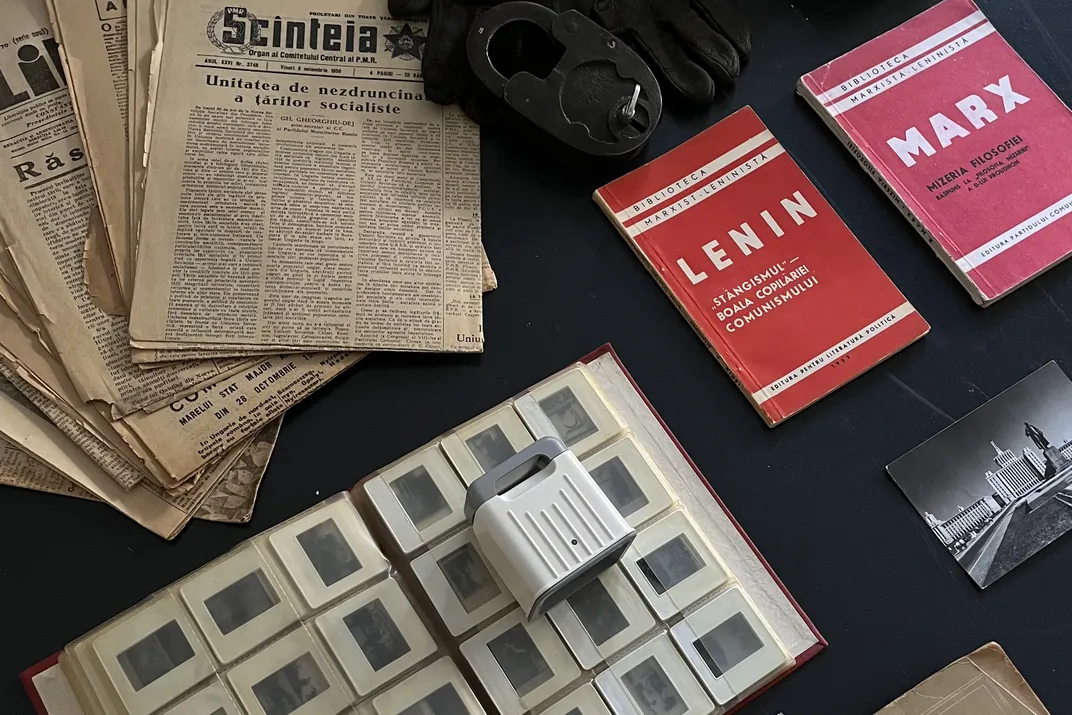 Historical newspapers and photographs at the Museum of Communism in Bucharest