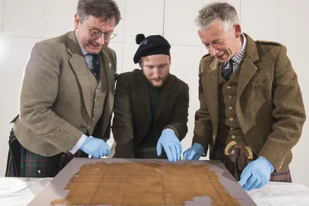 Discovered in a bog in Glen Affric, the tartan is now on view at V&amp;A Dundee.