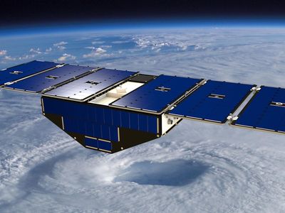 Artist's concept of a CYGNSS satellite monitoring a hurricane.