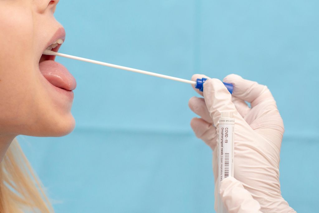 A child is tested for COVID-19