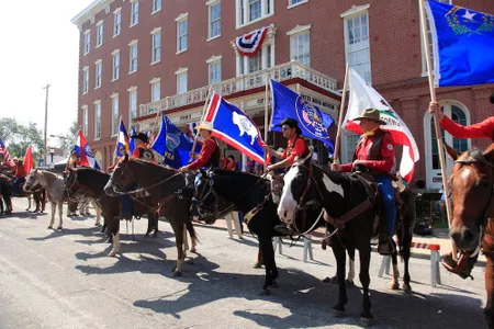 Riders outside the Patee House Museum in St. Joseph, Missouri, the route's eastern terminus. Every year the National Pony Express Association conducts an annual re-ride of the famous delivery route. 