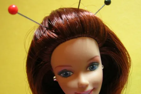 Acupuncture Barbie suffers from chronic pain.