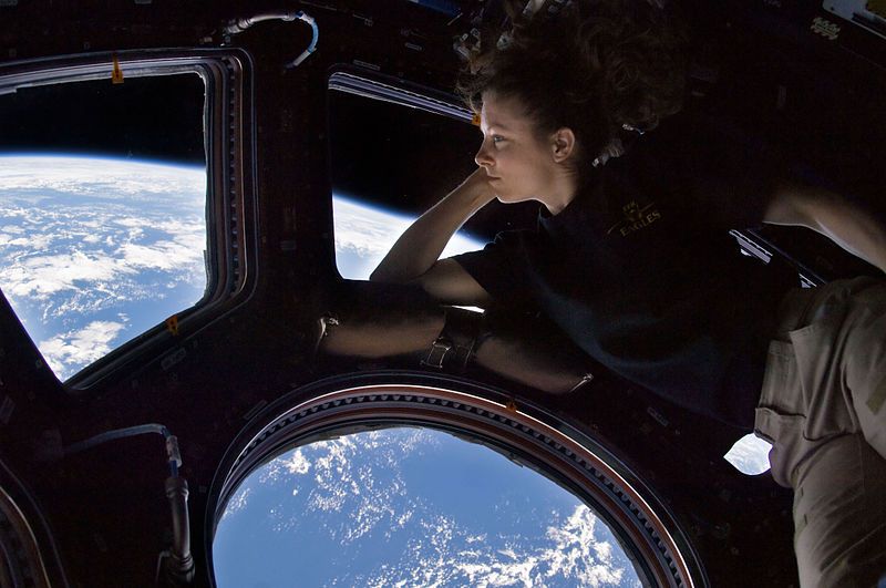Astronaut Tracy Caldwell Dyson in the ISS’ Cupola, where a micrometeorite hit the window last year.