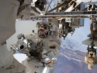 NASA astronaut Andrew Morgan during a 2020 space walk at the International Space Station. Researchers theorize that the weightlessness astronauts experience on the ISS contributes to immune system dysfunction.