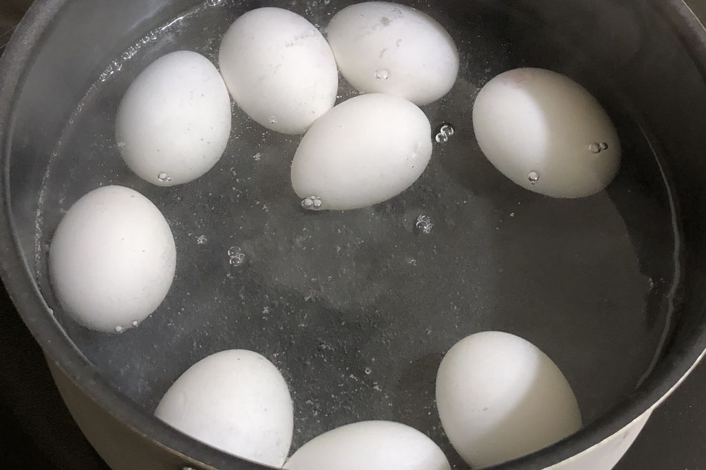 hard boiled eggs in hot water.