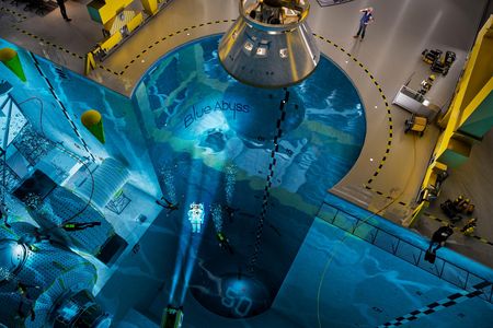 This computer-generated image of the Blue Abyss pool features a heavy-lifting crane at the top, an Astrolab in the lower left, and a 50-meter (164-foot) dive opportunity at its deepest point.
