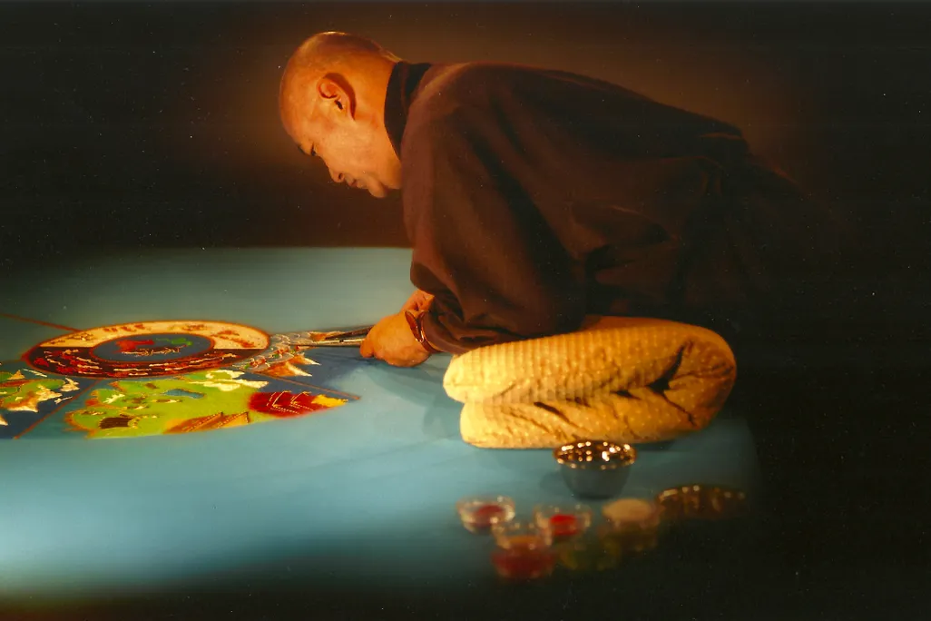 Losang Samten makes a sand mandala