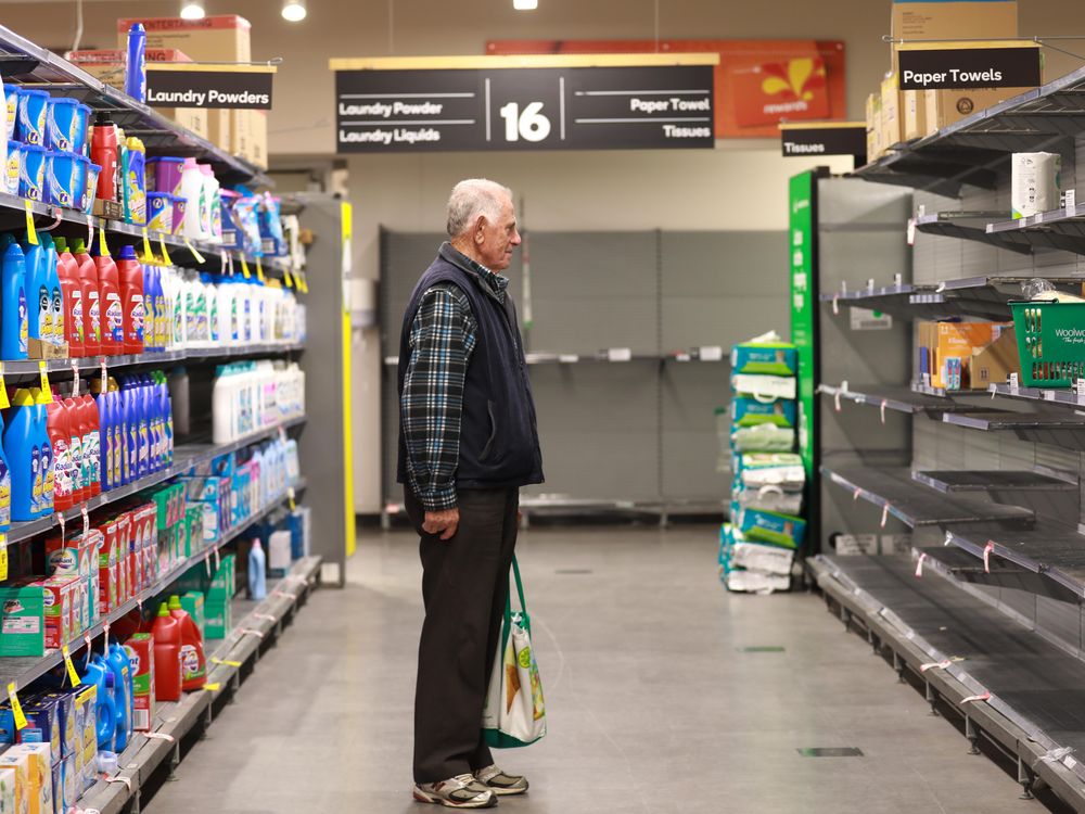 A senior shopping at a Woolworths supermarket in Canberra, Australia