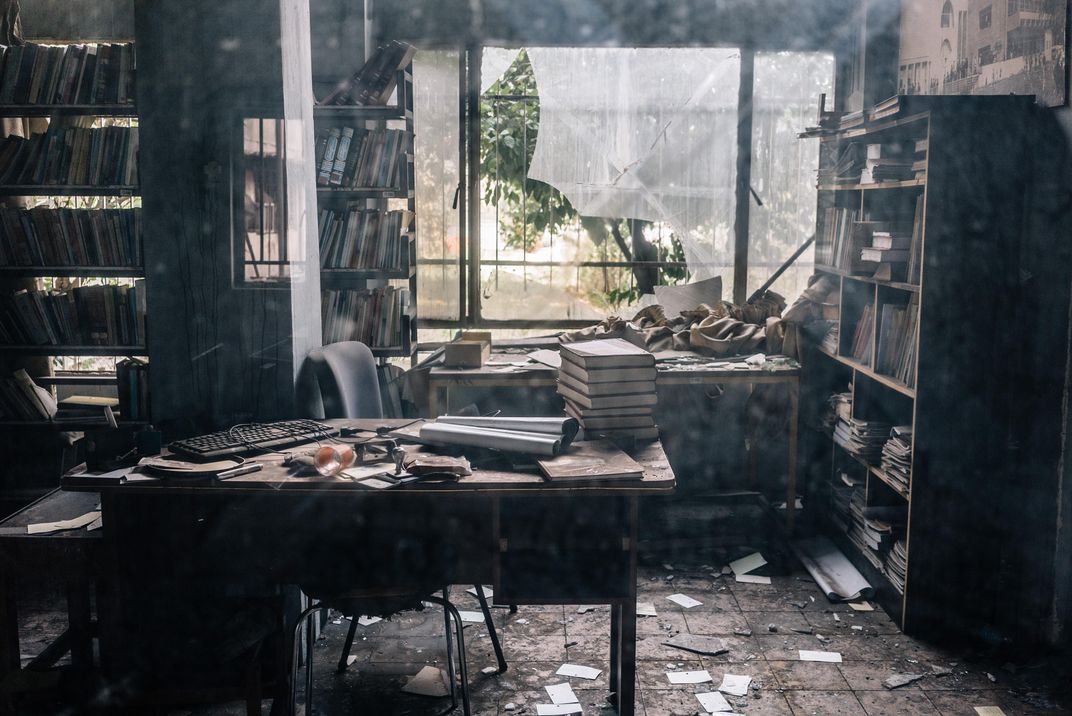 A small library in Mosul University where Salih used to work, heavily damaged by fighting.