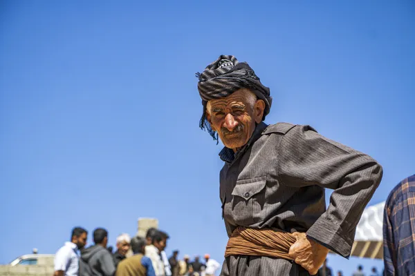 A man at a pet market waiting for an opportunity thumbnail