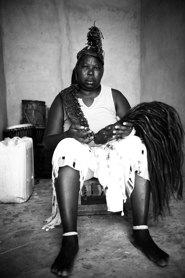 “Obosomfo Nana Azumah posing with her spiritual items/talisman” thumbnail