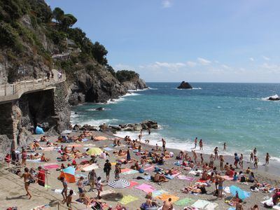A crowded beach in Cinque Terre, Italy