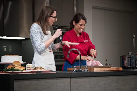 At the National Museum of American HIstory's demonstration kitchen, chefs like Chef Lynne Just of Sur La Table (above) prepare dishes, while food historian Ashley Rose Young engages them in conversations about the history and significance of the food and its traditions.