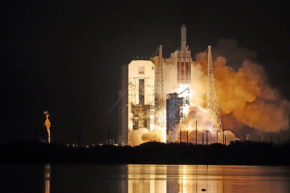 OPENER - A 235-foot-tall Delta IV takes off with 2.1 million pounds of thrust from its three RS-68A booster main engines, creating a magnificent light show in the sky.