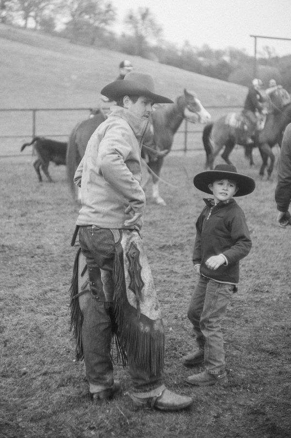 Mattley and his nephew Waylon at the cattle branding thumbnail