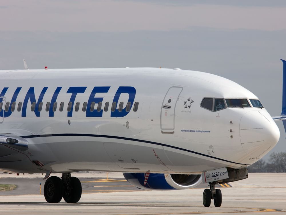 Airplane with the word United on it