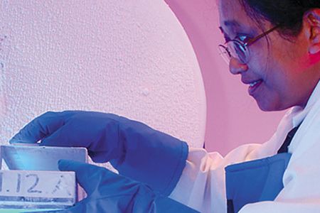 Entomology research technician Nor Faridah Dahlan with frozen tissue samples.