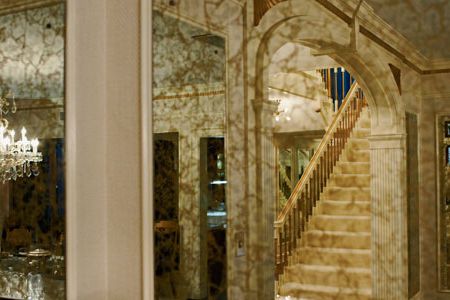 Graceland, Elvis Presley’s home in Memphis, has been kept largely as it was when he lived there, from 1957 until his death in 1977. Dining room mirrors reflect a stairway to the private quarters.