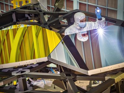 Inspecting the James Webb Space Telescope’s test mirrors.