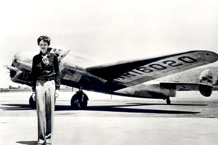 Amelia Earhart and the Lockheed Electra she was flying when she disappeared in 1937.