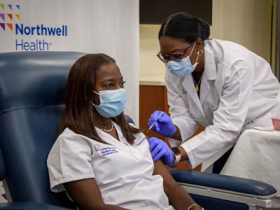 Sandra Lindsay, an intensive care nurse with Northwell Health, was the first person known to receive the approved vaccine in the United States on December 14, 2020.