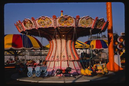 The fairground ride parallels a medieval training game for mounted fighters.