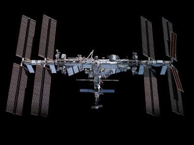 This mosaic depicts the International Space Station pictured from the SpaceX Crew Dragon Endeavour during a fly around of the orbiting lab.