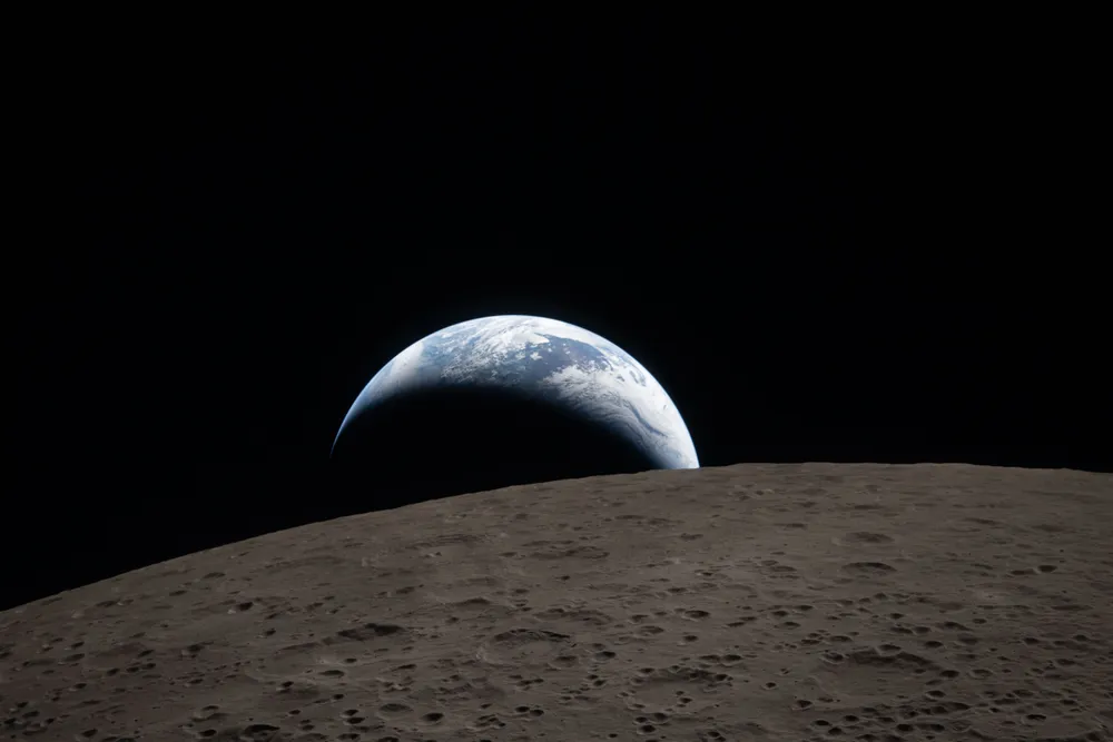 Earth appears to rise over the moon