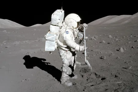 Harrison Schmitt, Apollo 17 astronaut and geologist, collecting samples of lunar soil in 1972. Along with Eugene Cernan, Schmitt collected about 245 pounds of material for return to Earth.