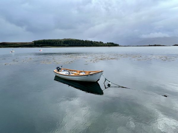 A small boat near the Eilean Iarmain, on Isle Ornsay at the Isle of Skye thumbnail