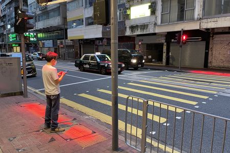 So far, pedestrians have mixed feelings about the experimental new lights in Hong Kong.