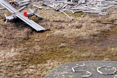 When a Super Cub ran out of fuel and had to land on uninhabited Kayak lsland in Alaska in May 2011, the pilot and passenger tried both low- and high-tech alerts. In addition to the “SOS,” they activated a SPOT beacon, and were rescued by the Coast Guard.