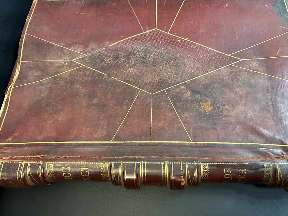 Weathered red leather book