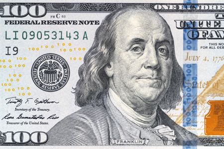 Benjamin Franklin's portrait on the 2009 design of the hundred dollar bill.