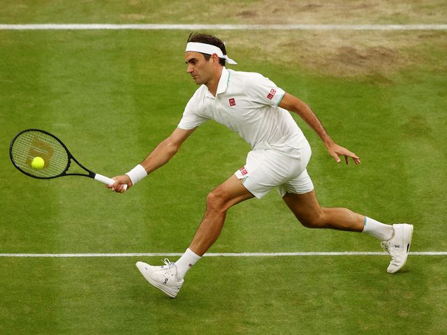 Roger Federer hits a forehand shot at Wimbledon. The tennis great has called his racket an extension of his arm.