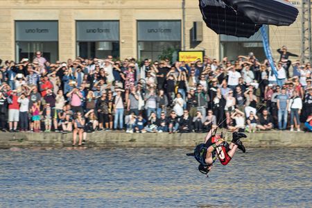 A swoop competitor performs a flip as part of his “Freestyle Trick,” judged on a point scale for difficulty and execution.