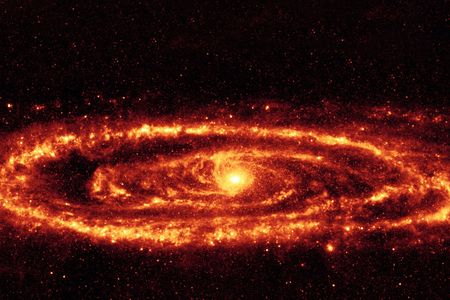 The dust rings of the Andromeda Galaxy stand out in this infrared image taken by the Spitzer Space Telescope. Astronomers have discovered even brighter infrared galaxies that have inspired some imaginative explanations.